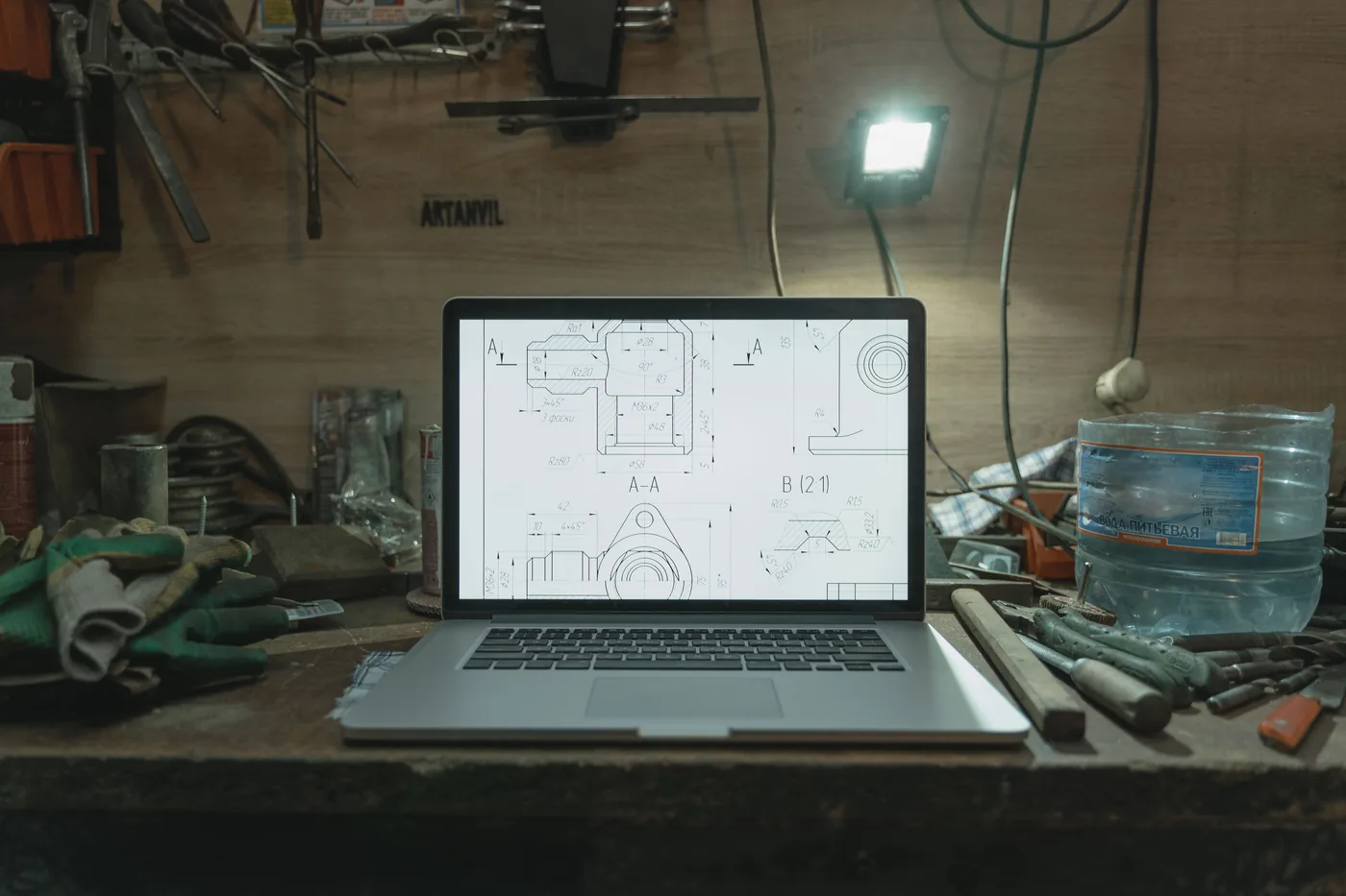 Engineering drawing displayed in a workshop during product development